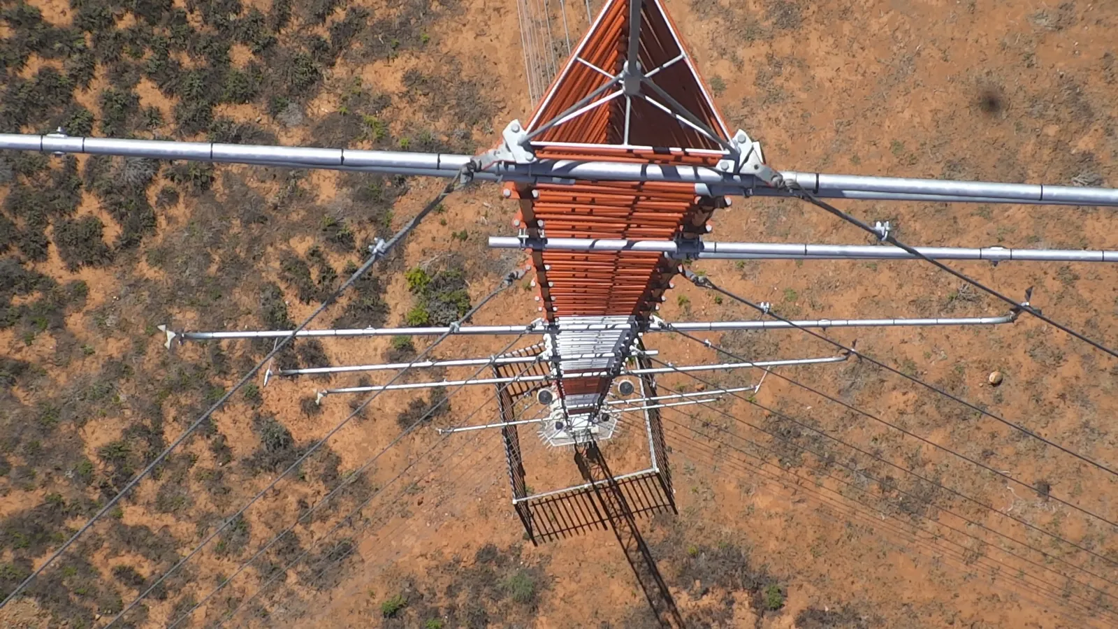 Aerial view of a lattice met mast used for wind measurement